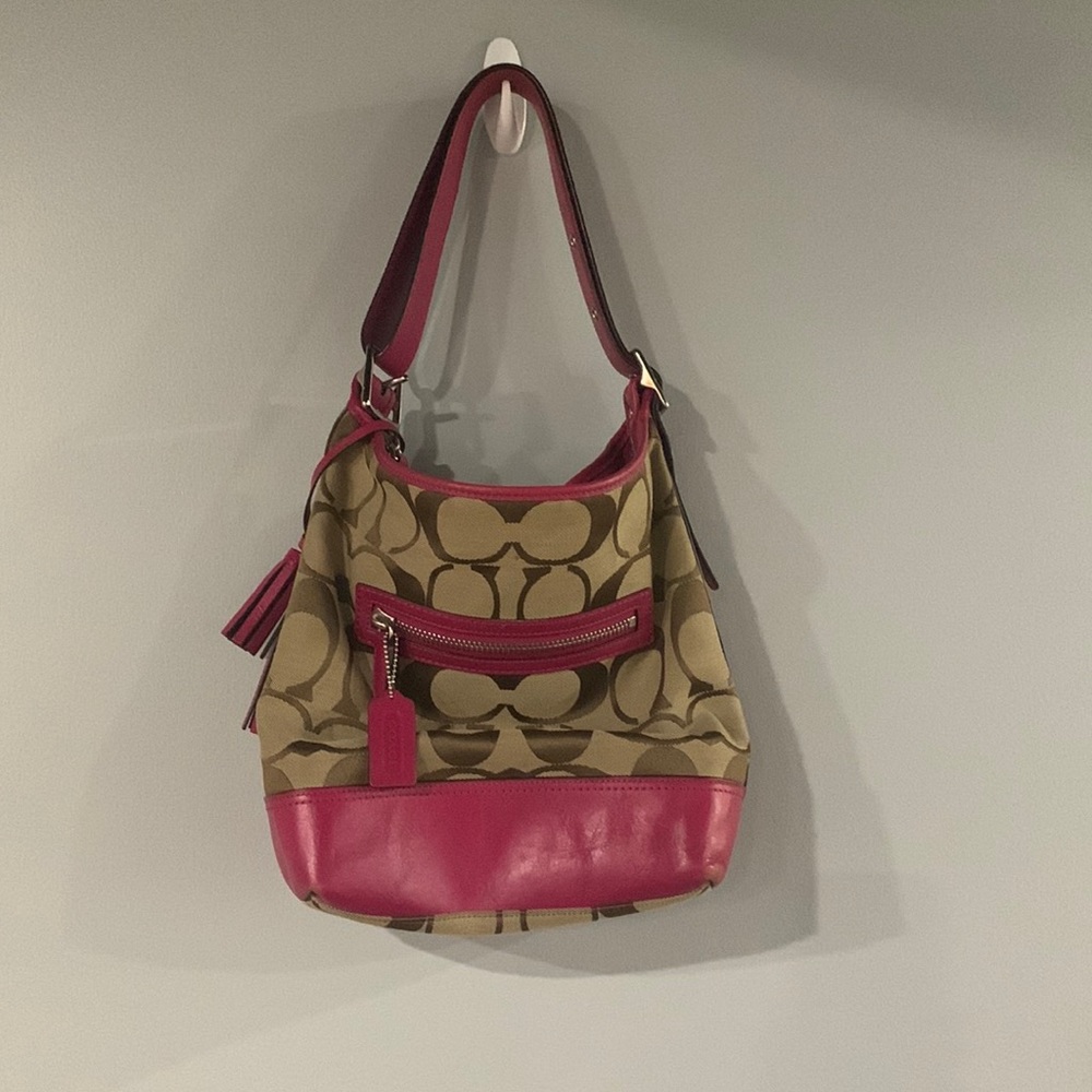 Coach bucket purse. Hot pink/brown. In great condition.